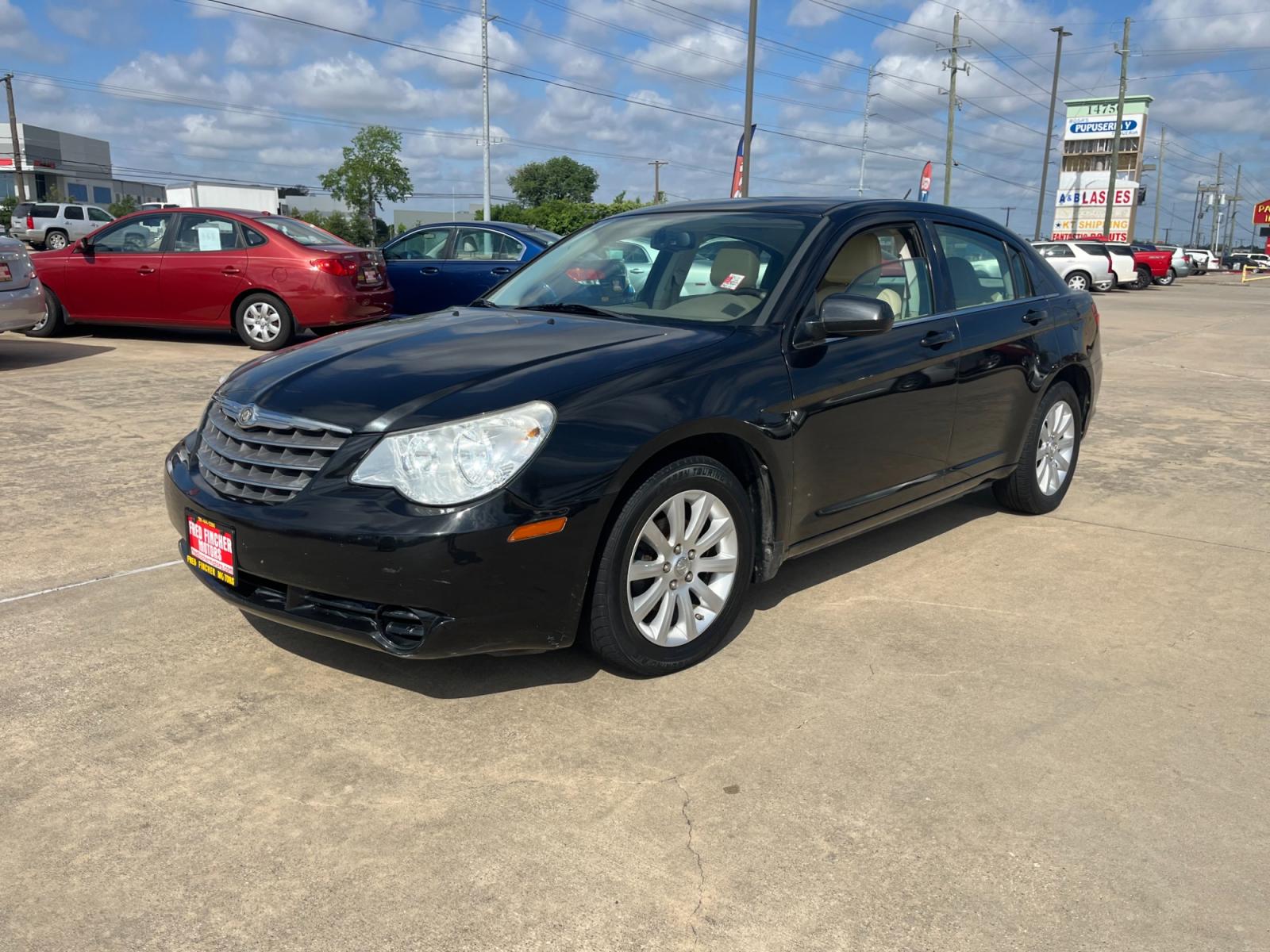 2010 Black /TAN Chrysler Sebring Sedan Limited (1C3CC5FB2AN) with an 2.4L L4 DOHC 16V engine, 4-Speed Automatic transmission, located at 14700 Tomball Parkway 249, Houston, TX, 77086, (281) 444-2200, 29.928619, -95.504074 - Photo #2